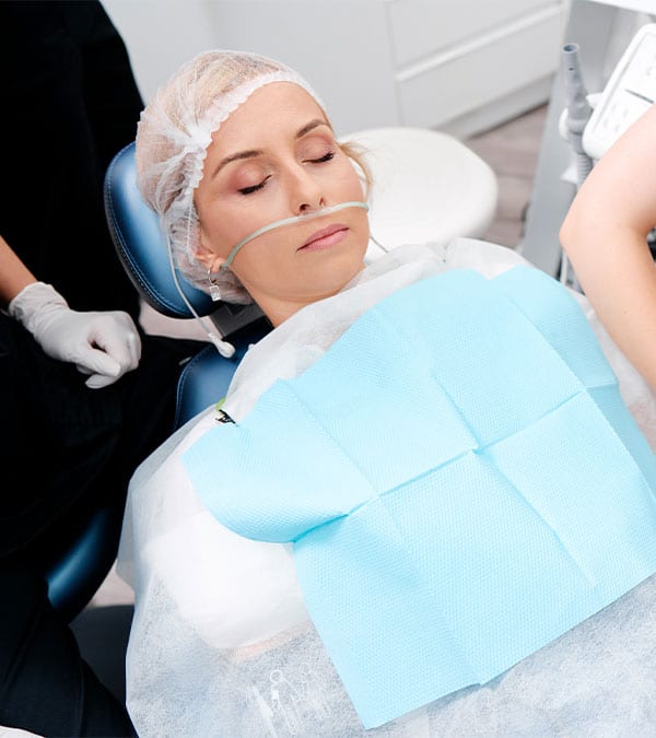 a female patient is being sedated